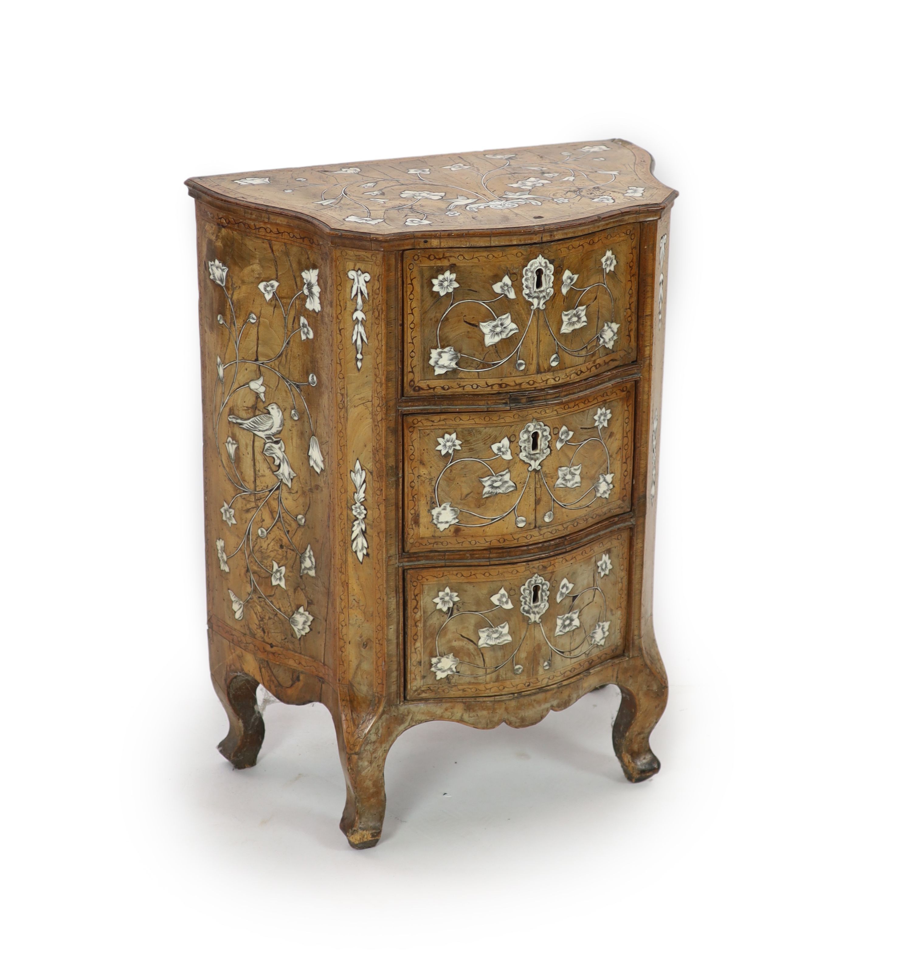 A mid 18th century North Italian marquetry inlaid walnut serpentine commode, W 60cm D 36cm H 78cm